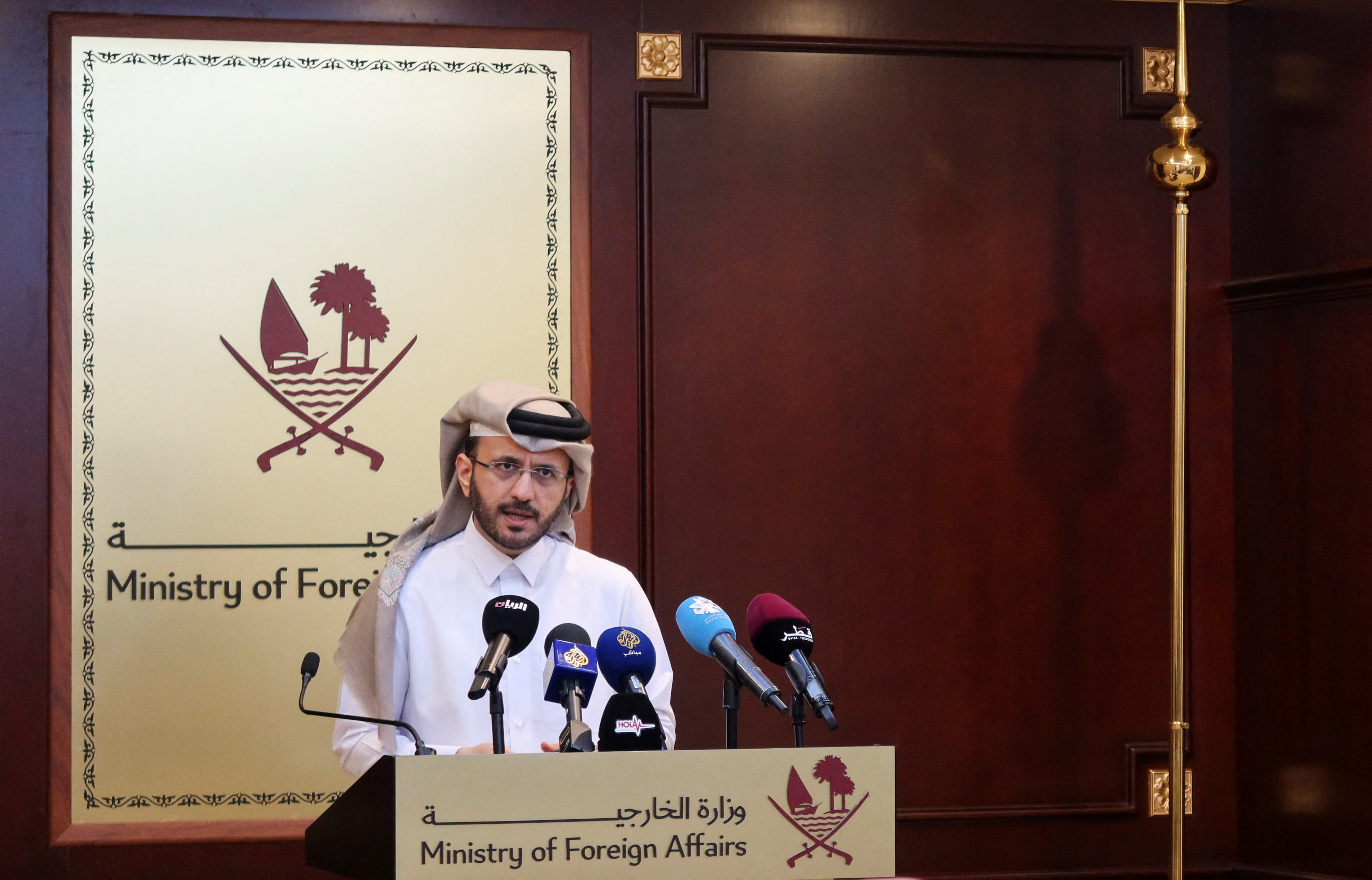 Qatar's foreign ministry spokesman Majed Al-Ansari, speaks during a weekly press briefing at the Ministry of Foreign Affairs in Doha