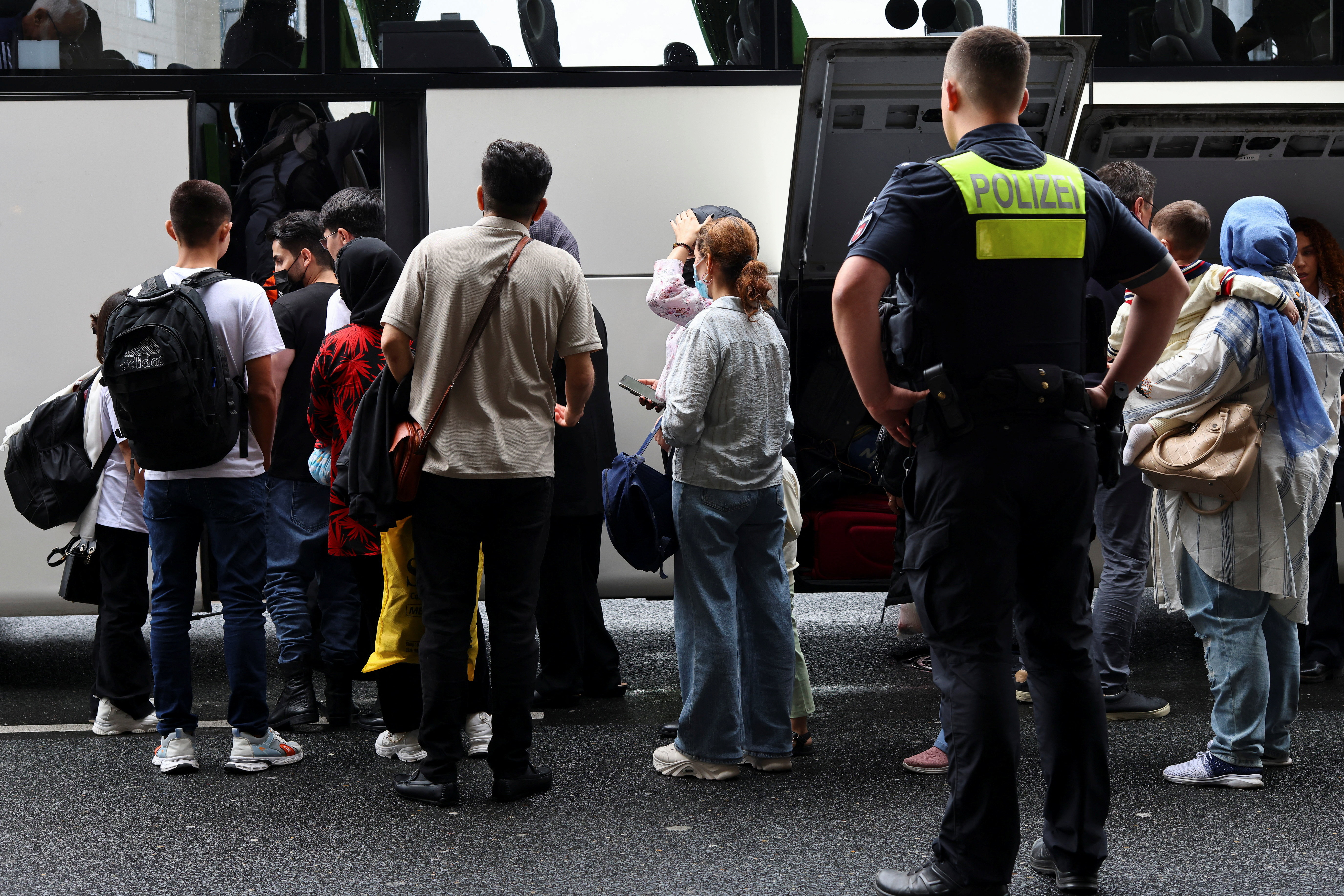 Group of Afghan nationals arrive in Germany from Pakistan at Hannover Airport