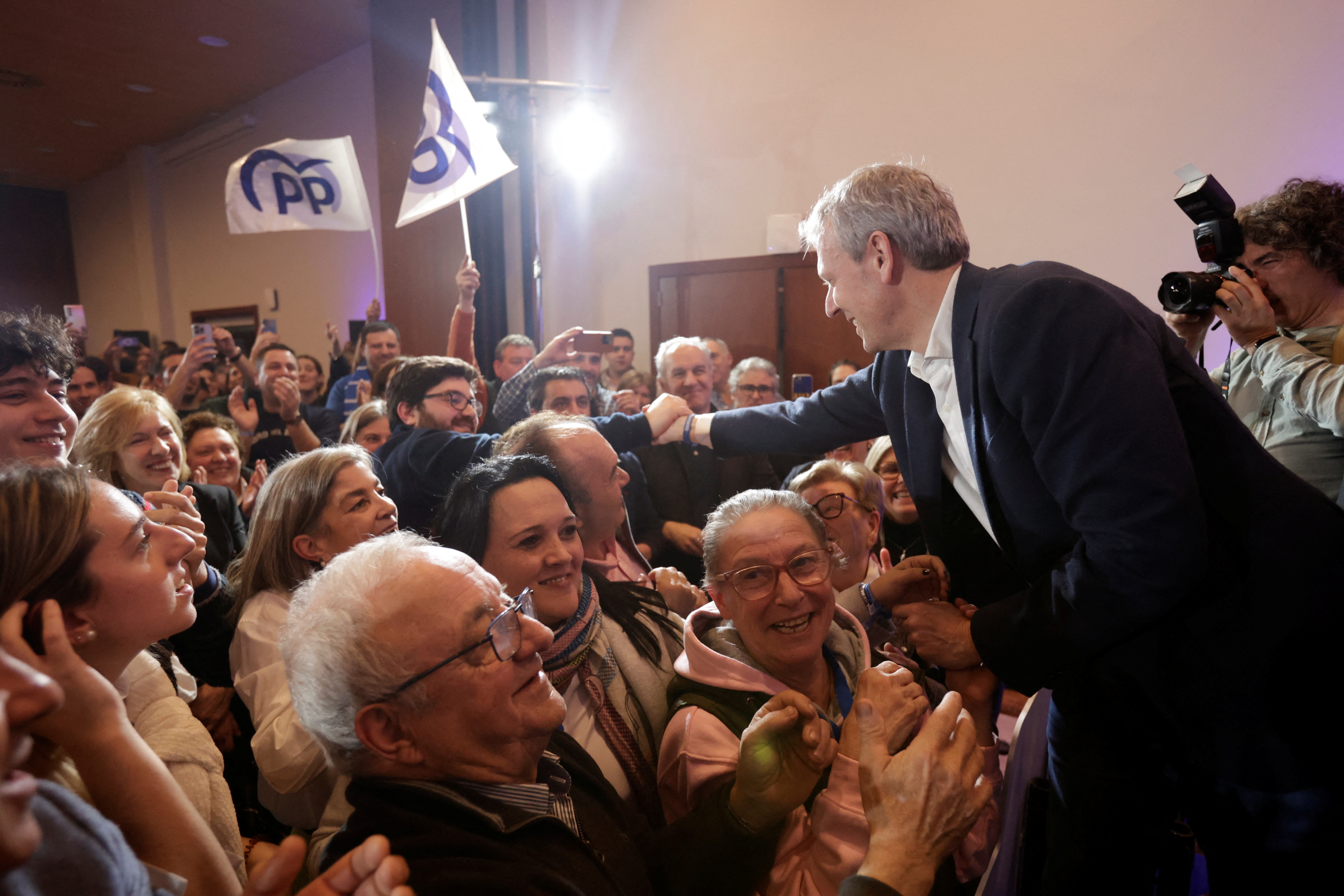 Galician President and candidate for re-election for the People's Party (PP) Alfonso Rueda greets supporters at Eurostars San Lazaro Hotel in Santiago de Compostela