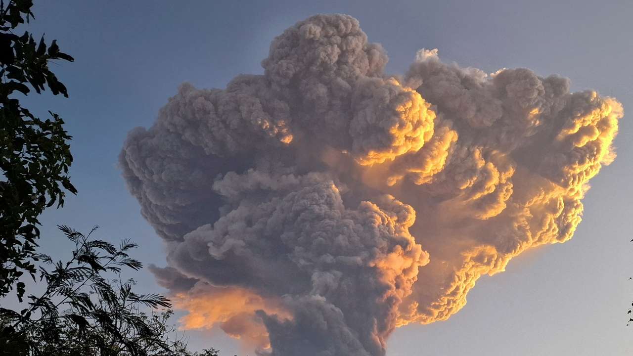 Mount Lewotobi Laki-laki spews smoke and volcanic ash as seen from Kawalelo village in East Nusa Tenggara province