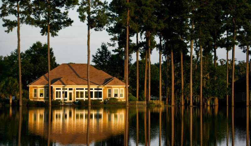 Floodwaters from tropical storm Debby fill a neighborhood in Hampton Hall, in Bluffton, SC