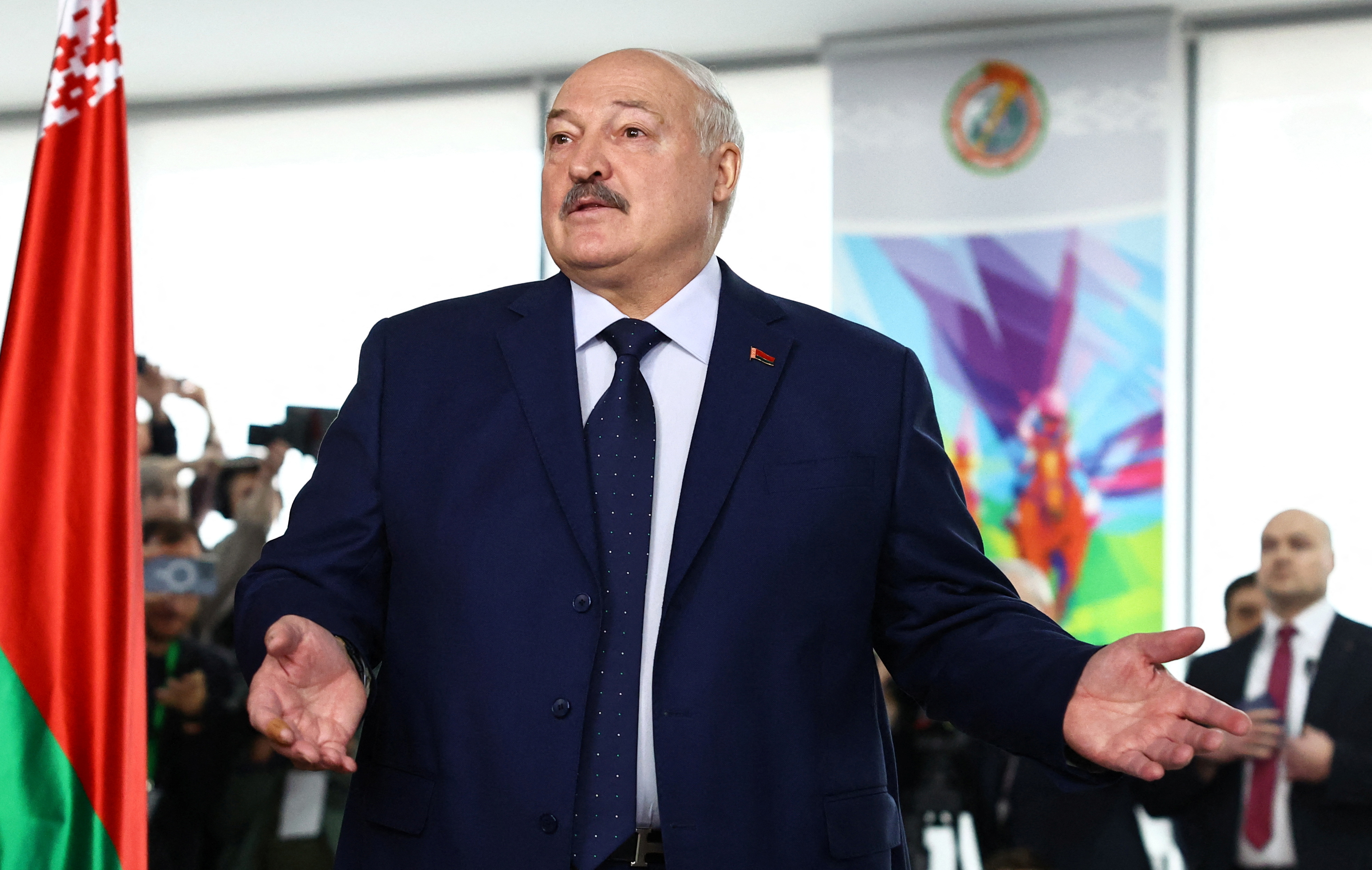 Belarusian President Alexander Lukashenko votes during the presidential election in Minsk