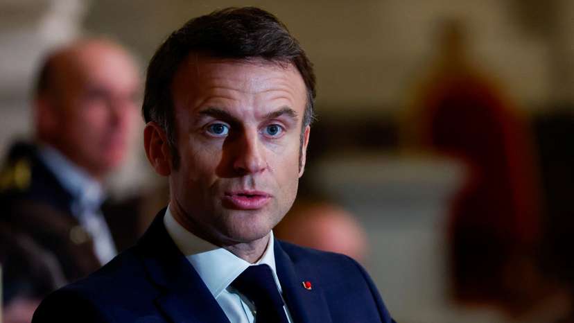 French President Macron and Lithuania's President Nauseda speak before a concert at Saint-Louis des Invalides cathedral in Paris