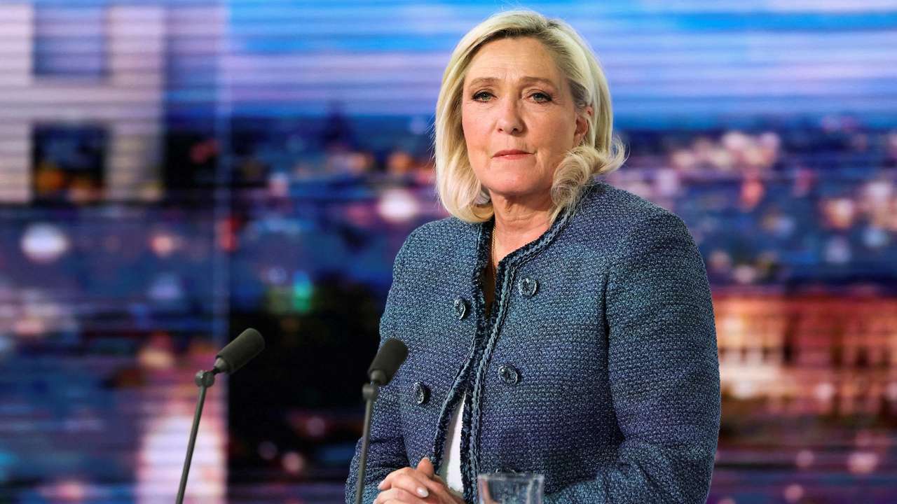 President of the far-right Rassemblement National (RN) parliamentary group Marine Le Pen poses prior to an interview on the evening news broadcast of French TV channel TF1, in Boulogne-Billancourt