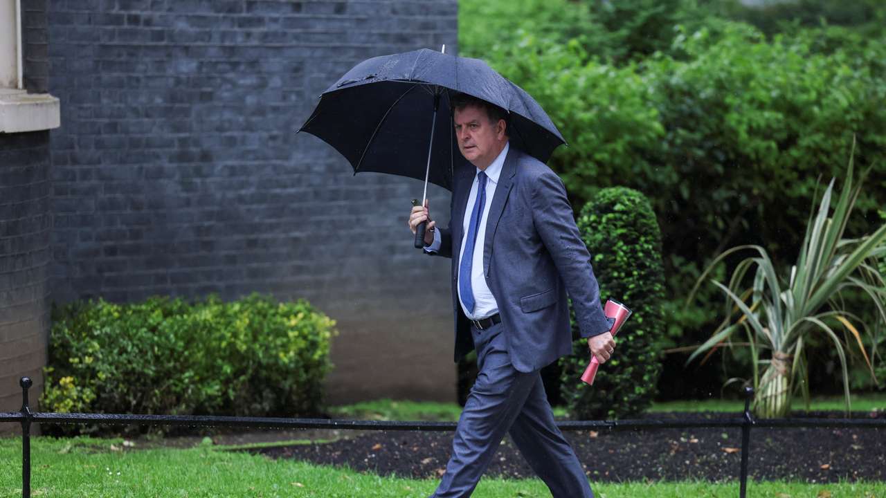 FILE PHOTO: British Secretary of State for Work and Pensions Mel Stride walks on Downing Street, in London