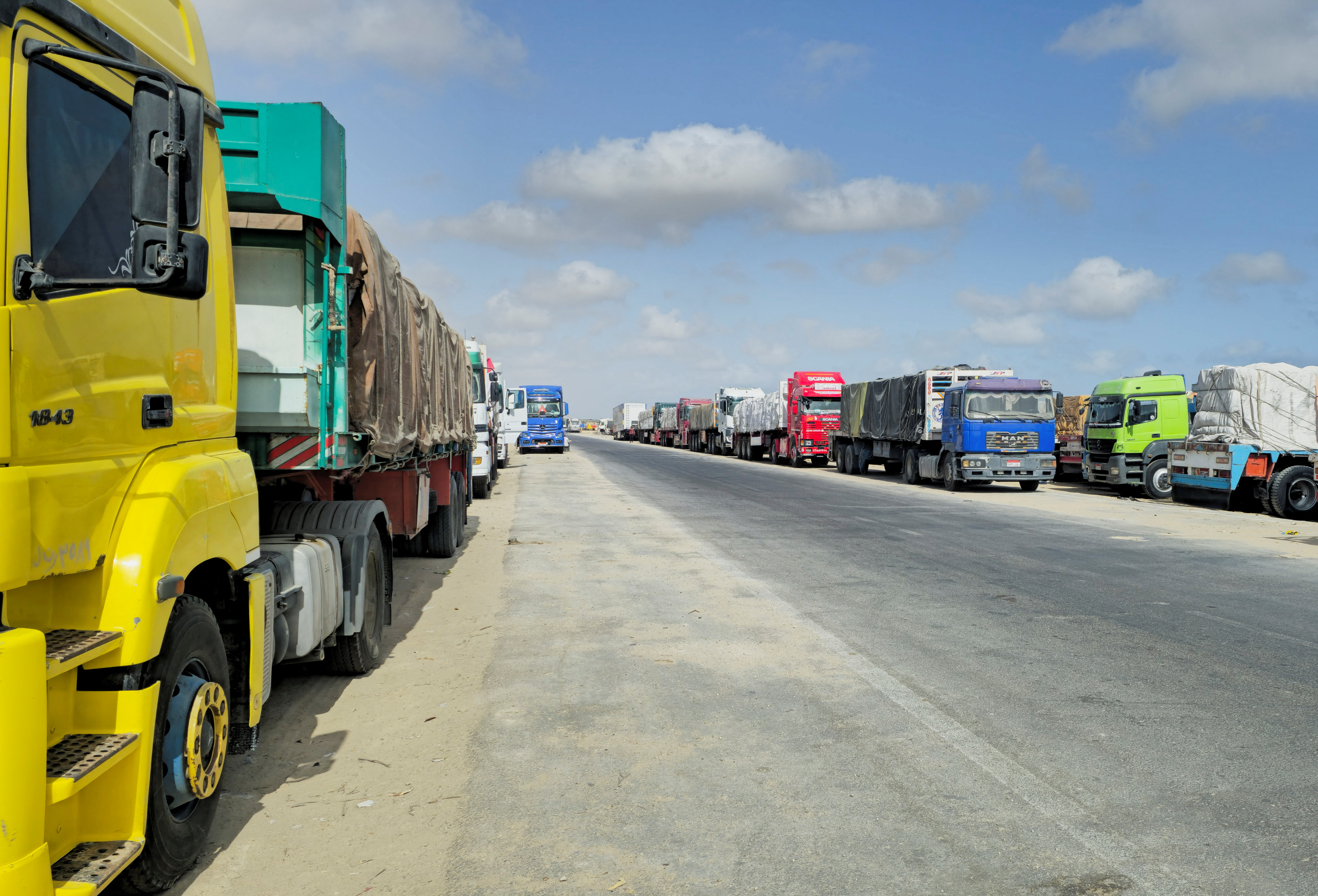 Trucks loaded with humanitarian aid for Gaza continue to wait in Al Arish to enter through the borders