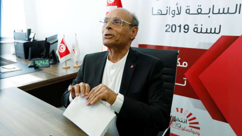 Former Tunisian President Moncef Marzouki submits his candidacy for the presidential election in Tunis