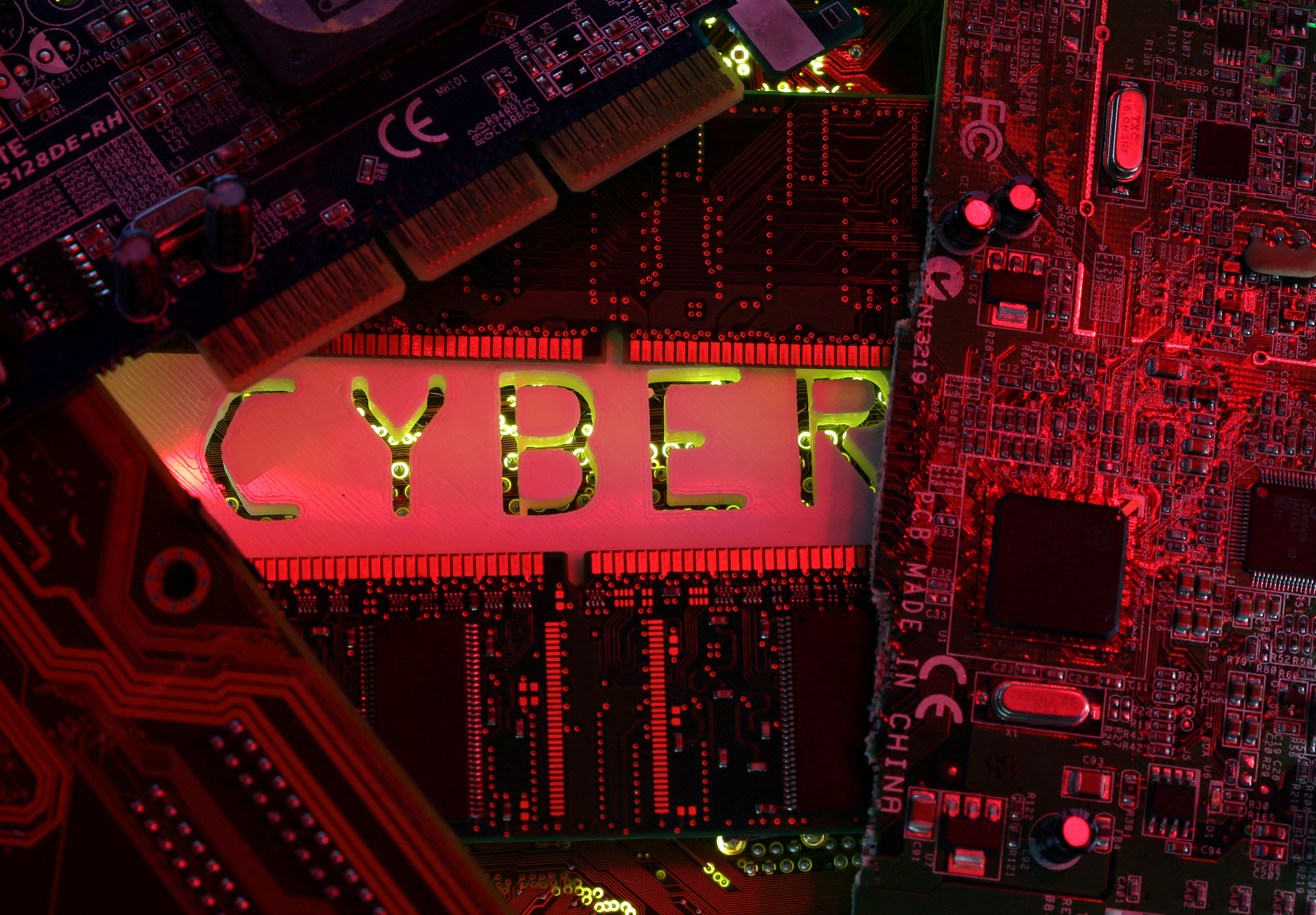 A 3D-printed Cyber word standing on PC motherboard is seen in this illustration picture
