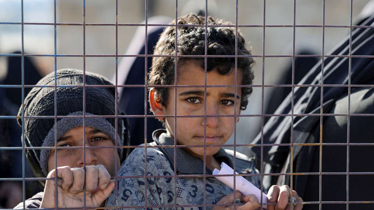 Detainees gather at al-Hol camp after the Syrian government took control of it, in Hasaka