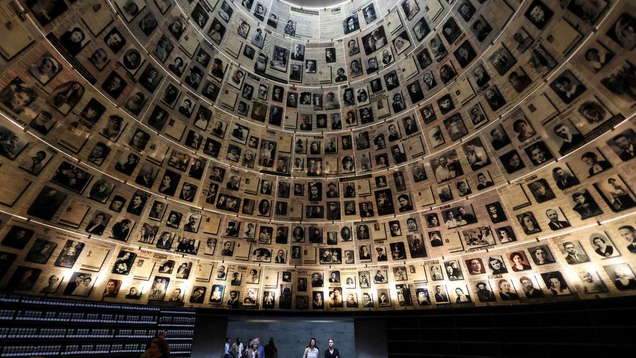 FILE PHOTO: Visitors tour an exhibition ahead of Israel's national Holocaust memorial day, at Yad Vashem in Jerusalem