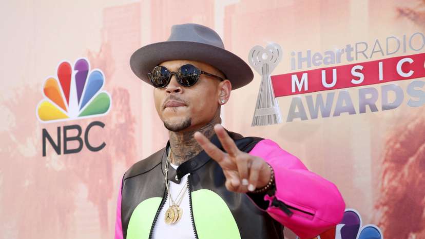 FILE PHOTO: Chris Brown poses at 2015 iHeartRadio Music Awards in Los Angeles