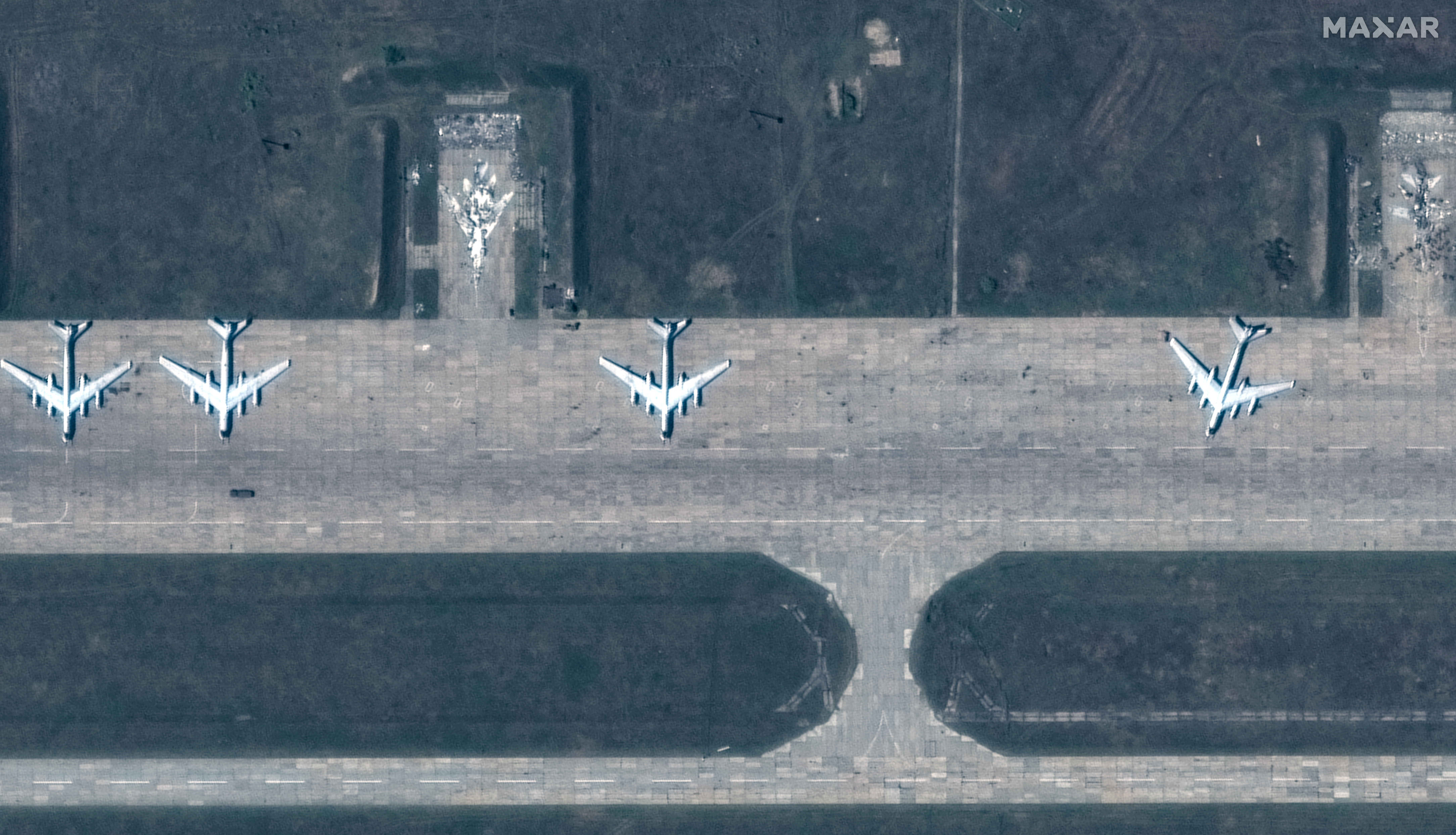 FILE PHOTO: A satellite image shows a group of TU 95 aircrafts before a drone strike, in Belaya airbase