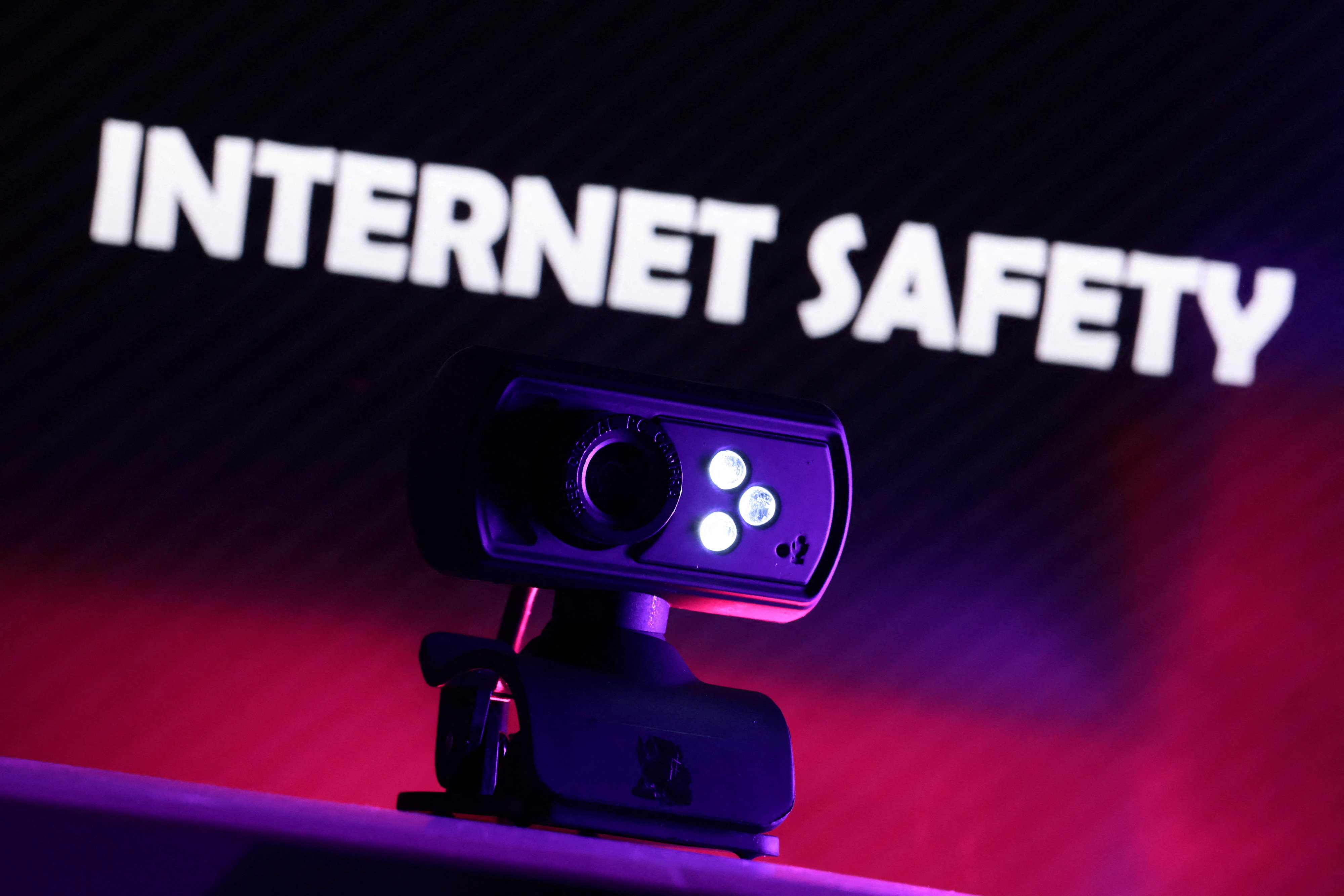 Illustration shows a web camera and the displayed words "Internet Safety\