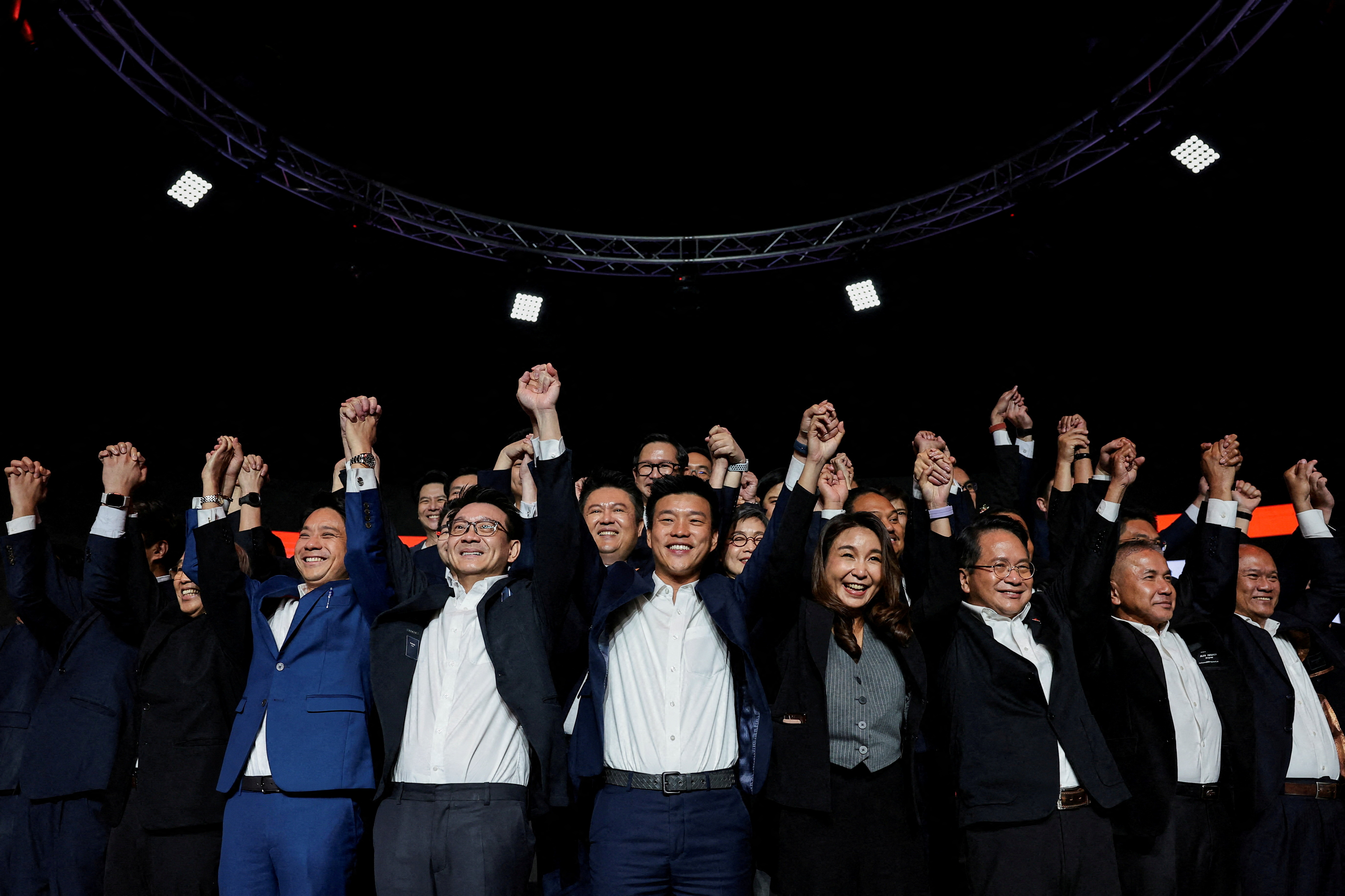 FILE PHOTO: People's Party PM candidate Natthaphong Ruengpanyawut attends a general election campaign rally in Bangkok