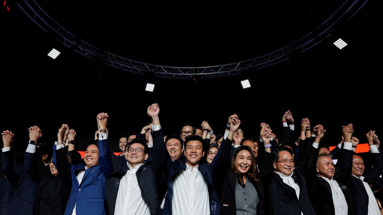 FILE PHOTO: People's Party PM candidate Natthaphong Ruengpanyawut attends a general election campaign rally in Bangkok