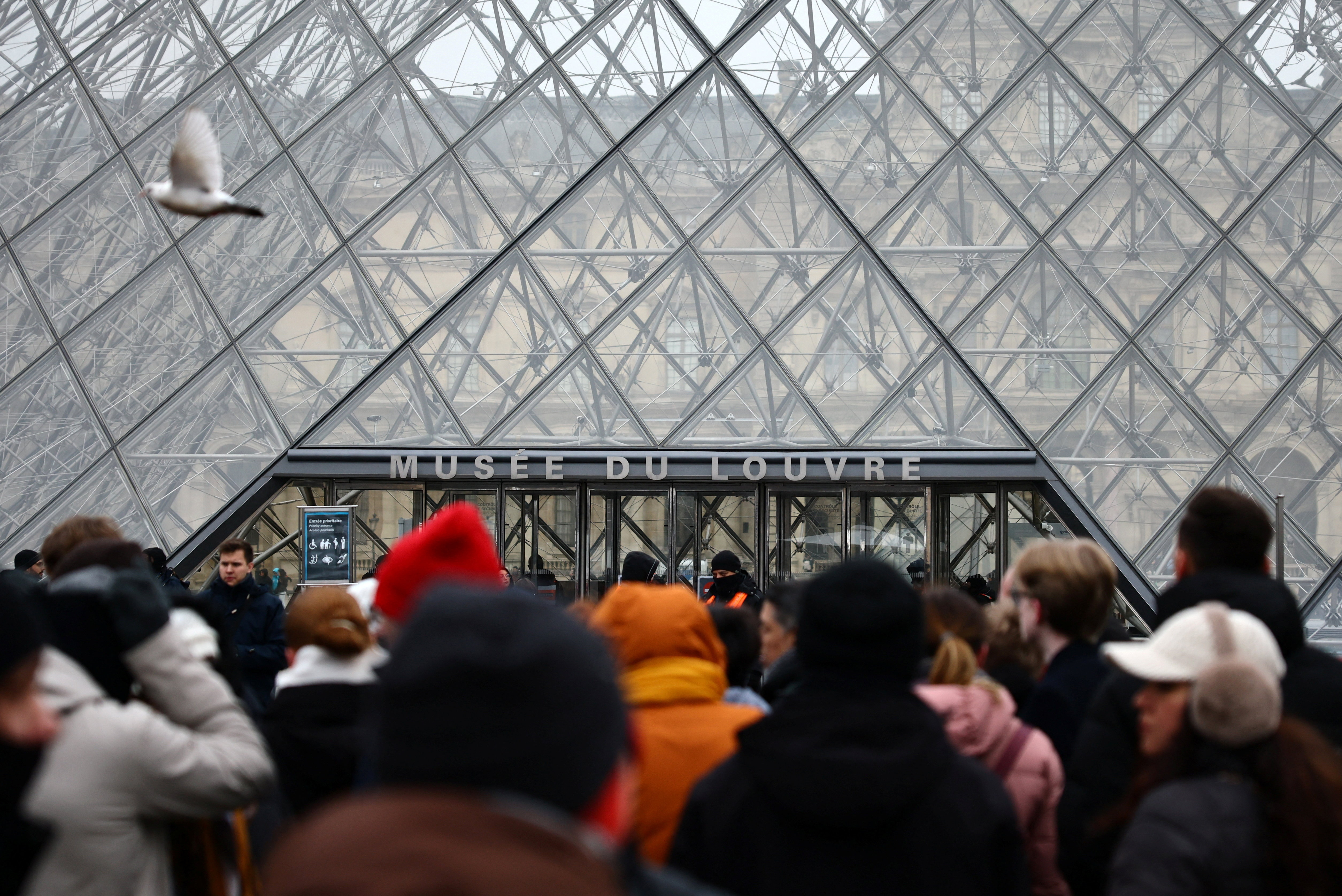 Opening at Paris Louvre museum delayed as employees discuss possible strike