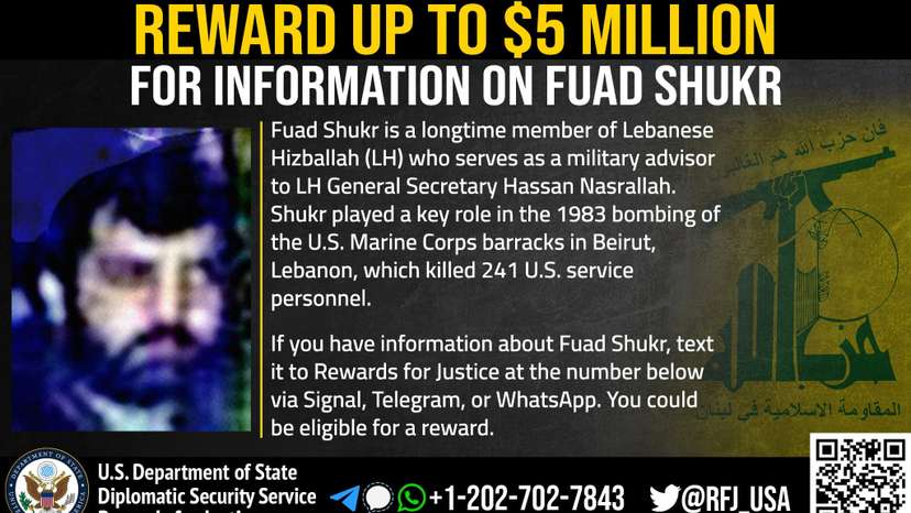 An undated photograph of Muhsin Shukr, also known as Fuad Shukr, head of Hezbollah's operations center, appears on a wanted poster