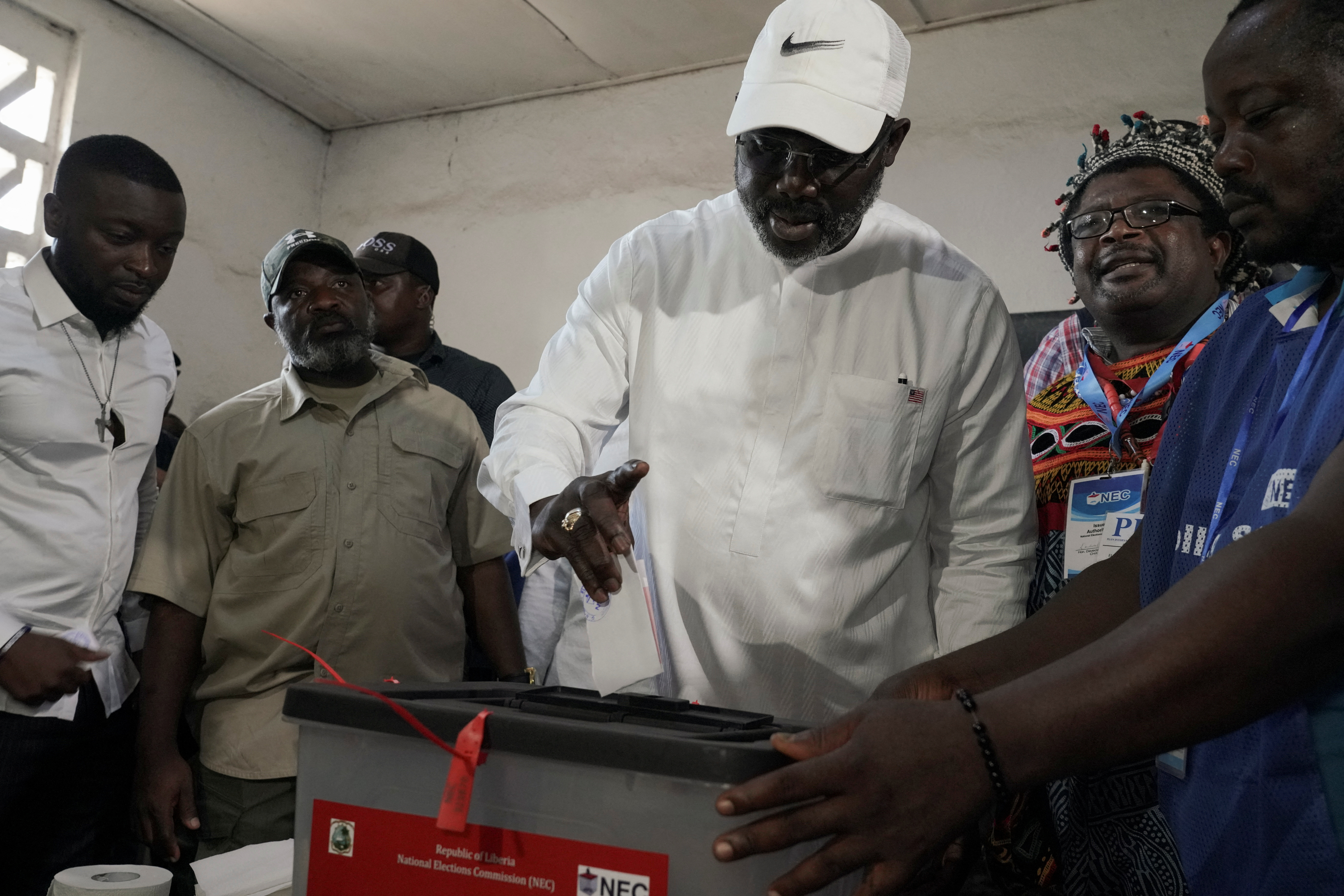 Liberians vote in tight presidential run-off
