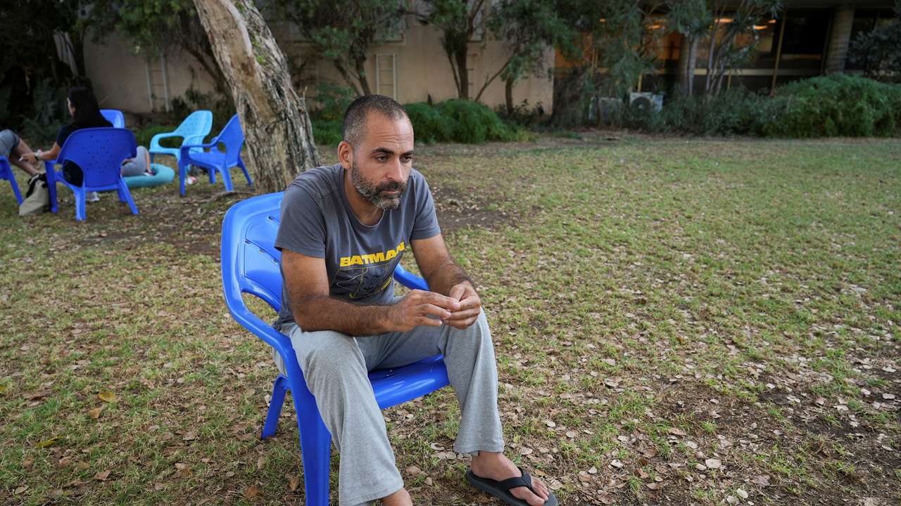 Avihai Brodutch, whose wife and three children were abducted by Hamas militants on October 7 from their home in Kibbutz Kfar Aza, is photographed during an interview with Reuters
