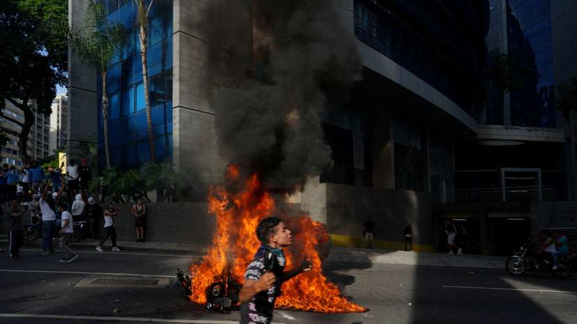 Supporters of Venezuelan opposition demonstrate following the announcement that Venezuela's President Maduro won the presidential election, in Caracas
