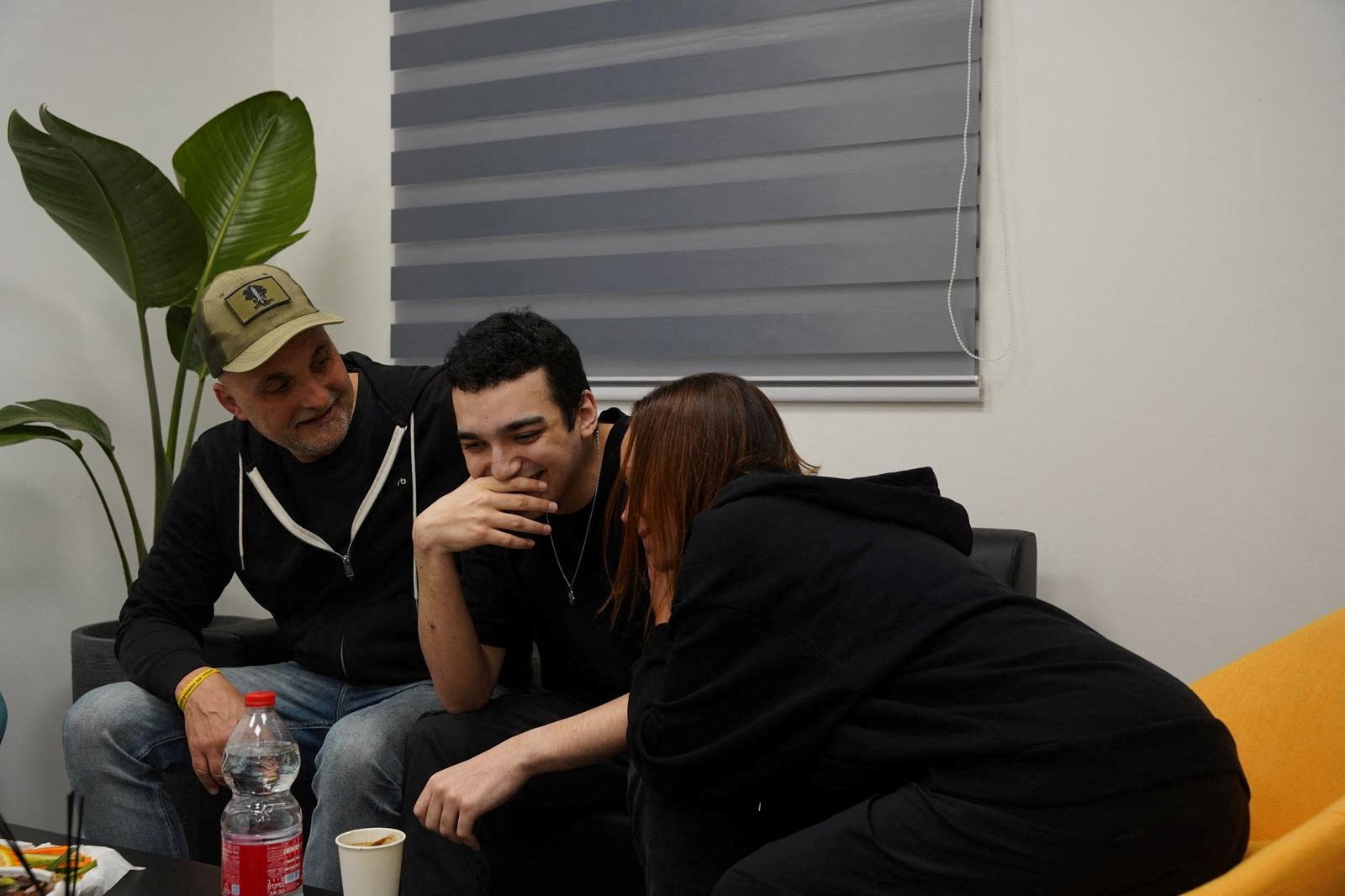 Edan Alexander, who has been released from captivity by Hamas, reunites with his family