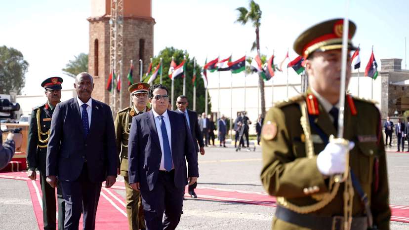 FILE PHOTO: Head of the Libyan Presidential Council Mohamed al-Menfi meets Sudan's Sovereign Council Chief General Abdel Fattah Al-Burhan in Tripoli