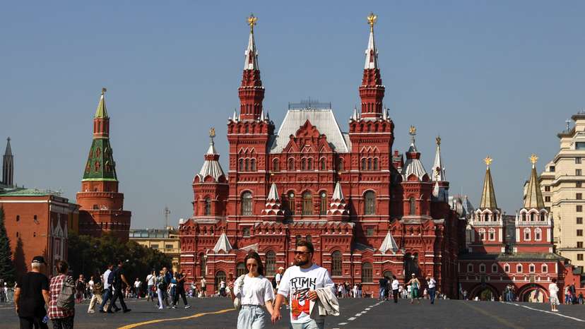 People walk in Red Square in Moscow