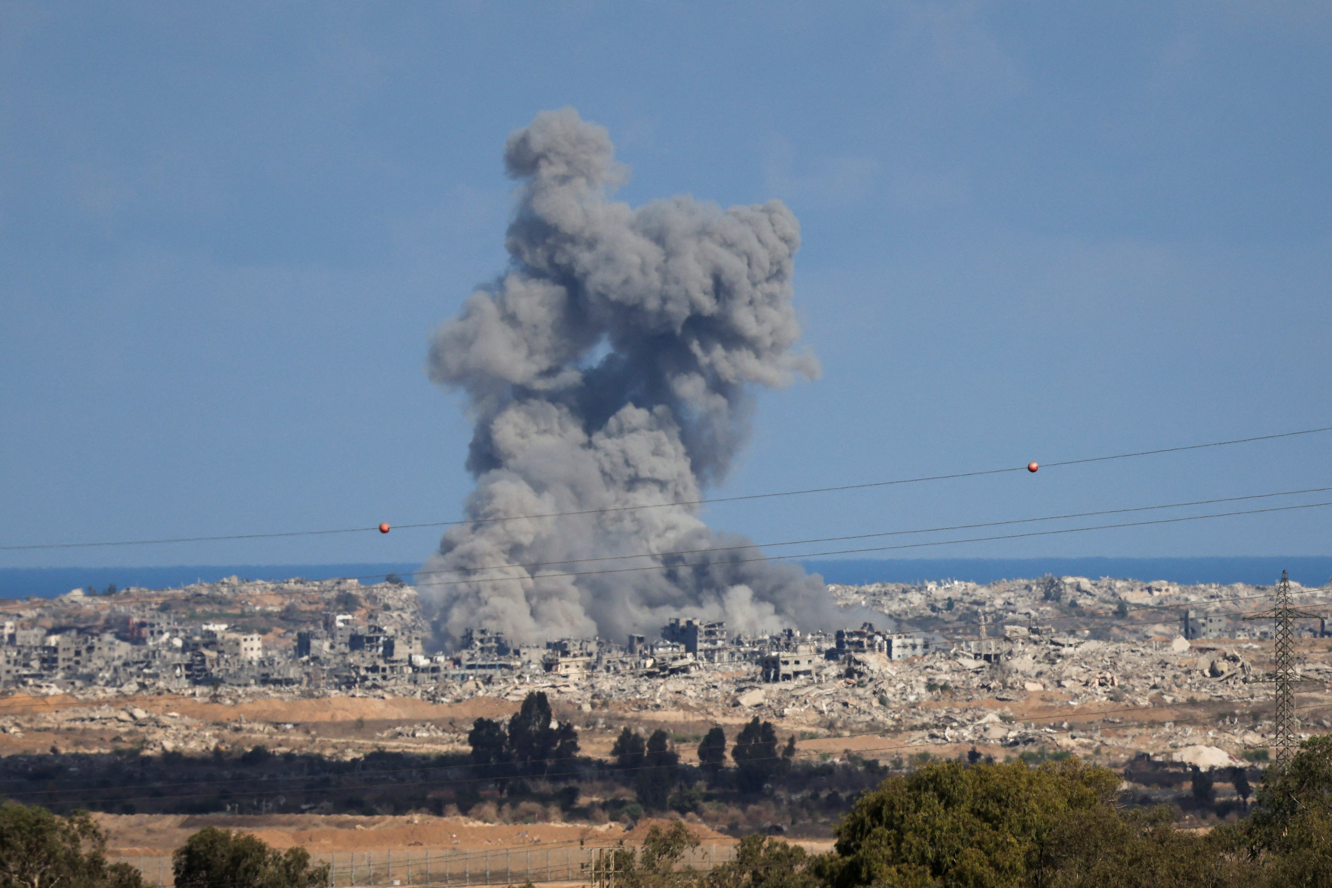 Smoke rises from explosions in Gaza, as seen from southern Israel