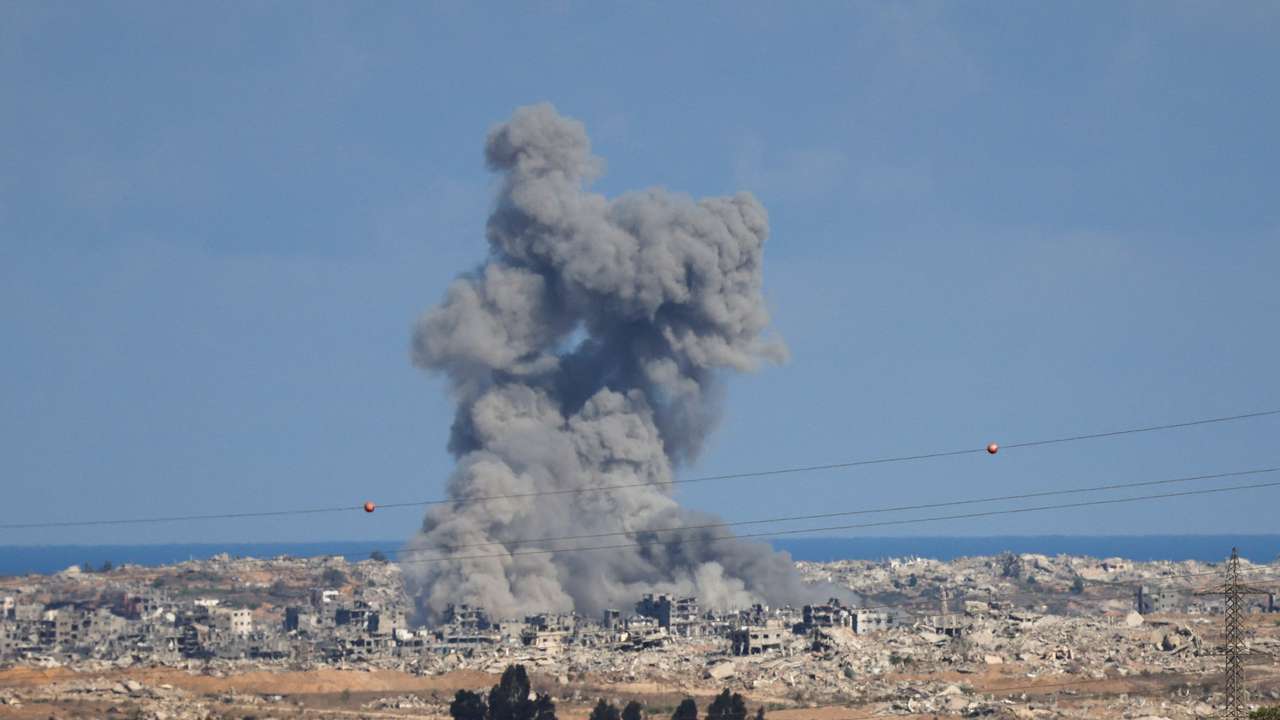 Smoke rises from explosions in Gaza, as seen from southern Israel