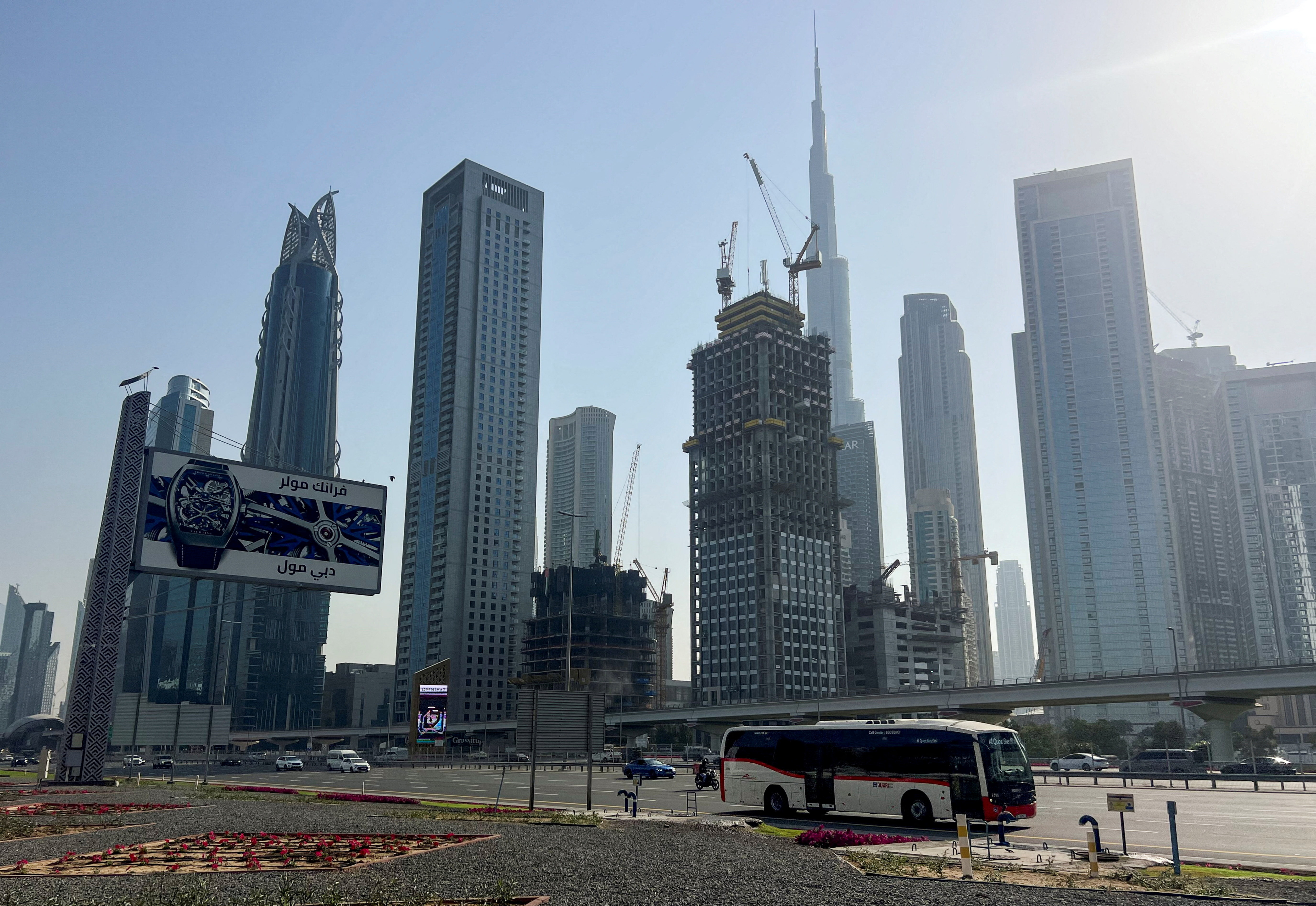 FILE PHOTO: Vehicles drive along a highway, amid the U.S.-Israeli conflict with Iran, in Dubai