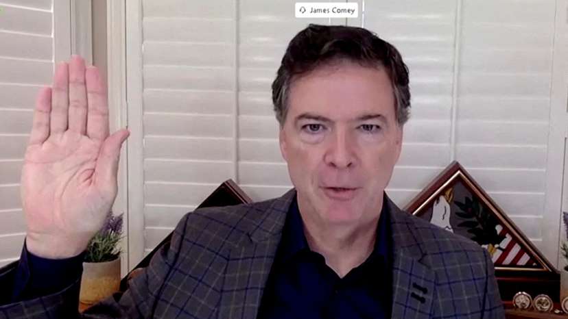 FILE PHOTO: Former FBI Director James Comey testifies before Senate Judiciary Committee in Washington