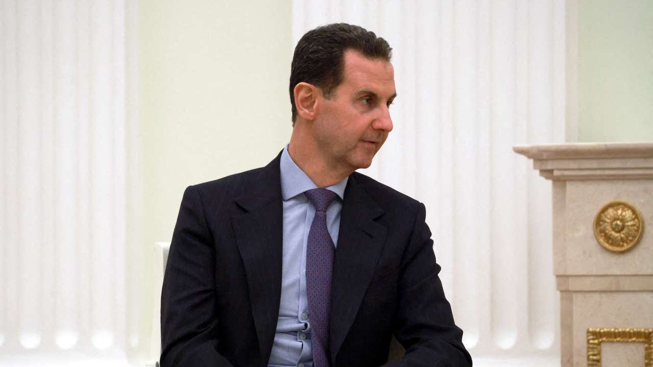 FILE PHOTO: Russia's President Putin and Syria's President Assad meet in Moscow