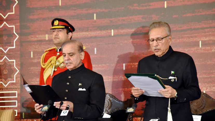Pakistan's President Arif Alvi administers the oath to Pakistan's newly elected Prime Minister Shehbaz Sharif, in Islamabad