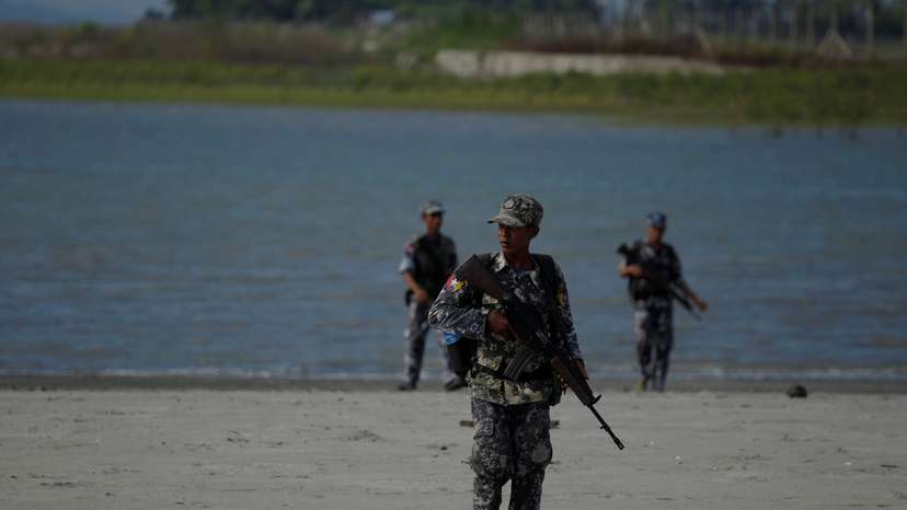 FILE PHOTO: Myanmar border guard police force patrol near the Myanmar-Bangladeshi border outside Maungdaw