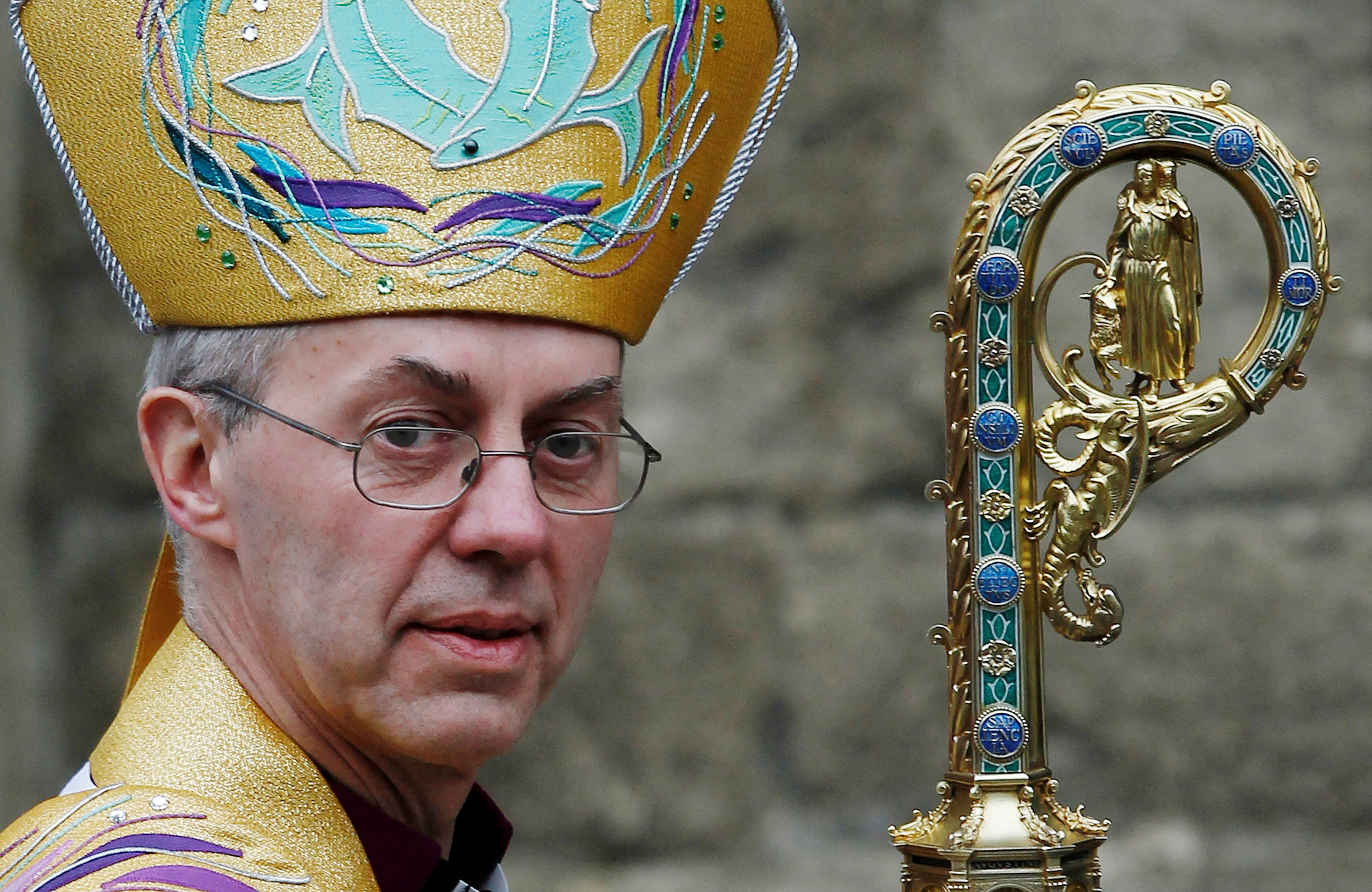FILE PHOTO: The new Archbishop of Canterbury Justin Welby leaves after his enthronement ceremony at Canterbury Cathedral, in Canterbury, southern England