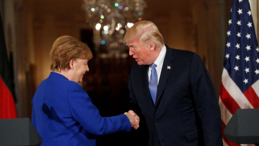 FILE PHOTO: U.S. President Trump and German Chancellor Merkel hold joint news conference at the White House in Washington