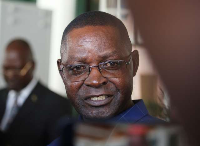 Former Zimbabwe National Army (ZNA) Commander Retired Lieutenant General Anselem Sanyatwe is sworn in as Minister of Sports, Recreation, Arts and Culture, at State House in Harare