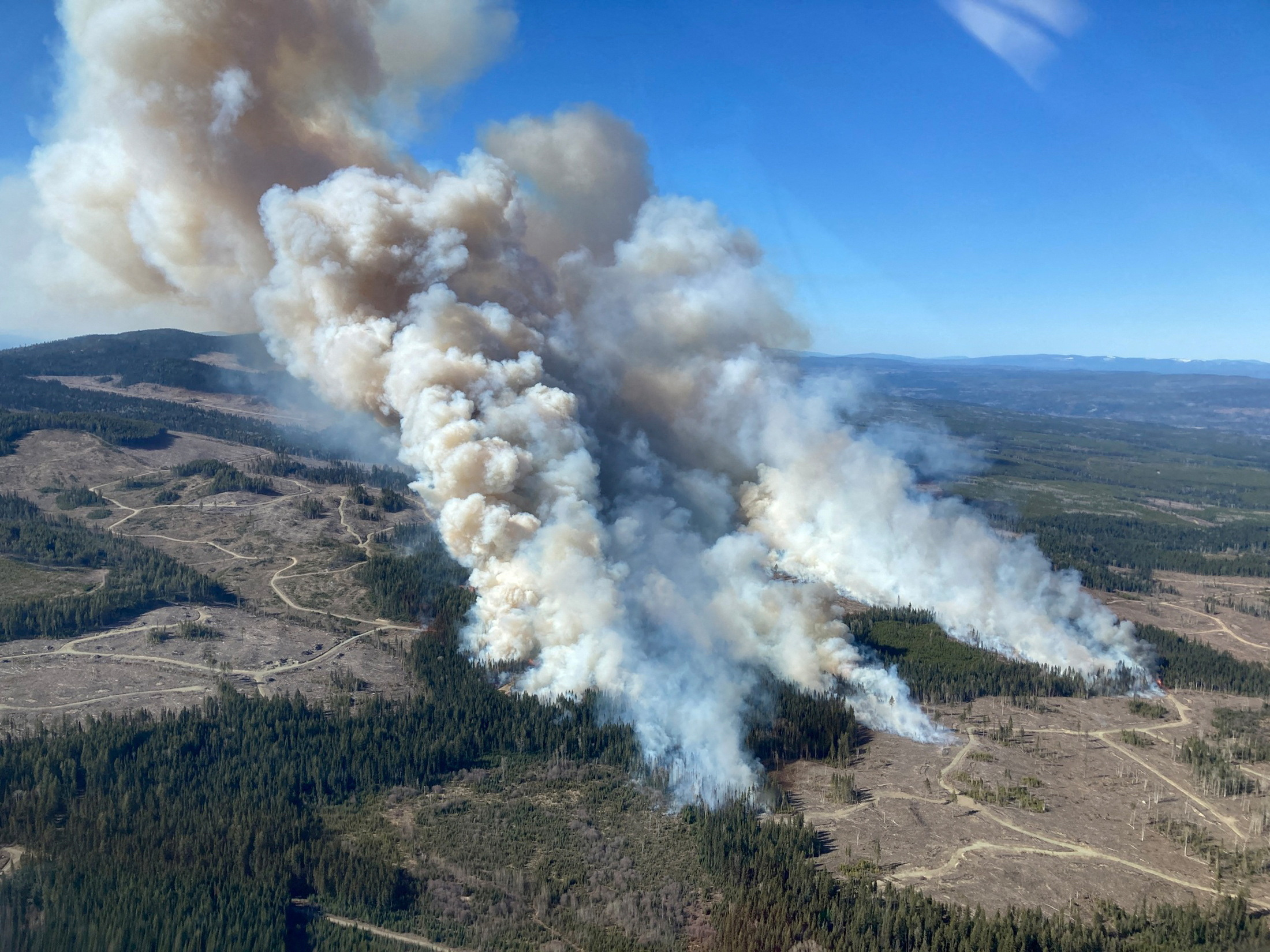 FILE PHOTO: Smoke rises from the  Burgess Creek wildfire (C20117) near Quesnel