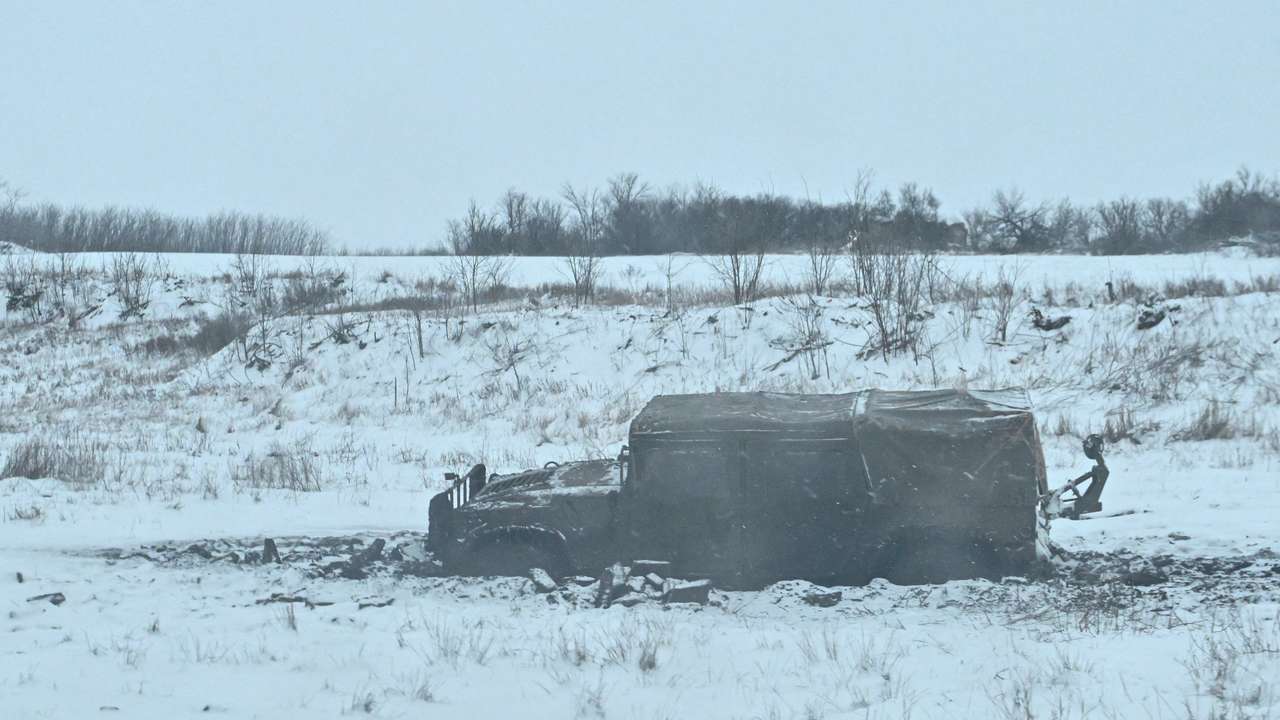 Humvee of Ukrainian servicemen stuck in mud near a front line in Zaporizhzhia region