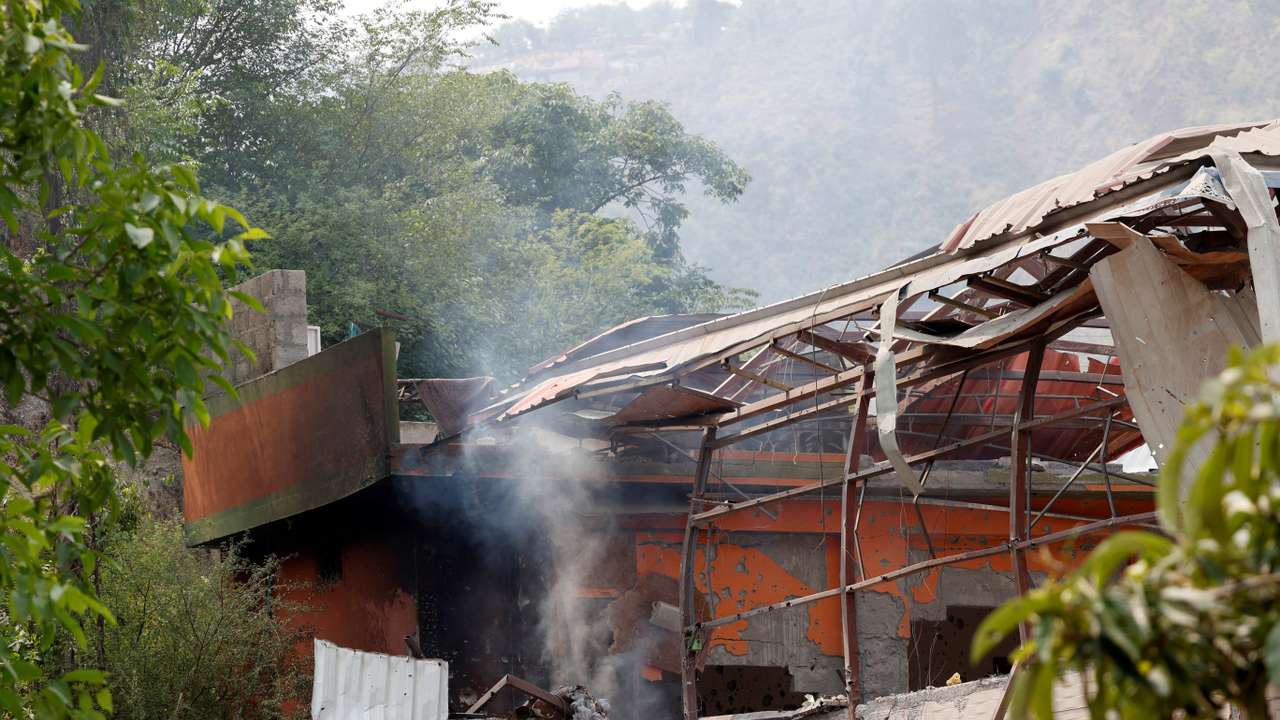Smoke rises from Bilal Mosque after it was hit by an Indian strike in Muzaffarabad