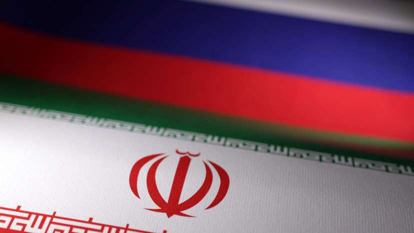Illustration shows Iranian and Russian flags