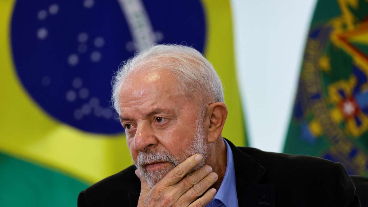 Brazil’s President Luiz Inacio Lula da Silva reacts during a meeting with members of the automotive sector in Brasilia