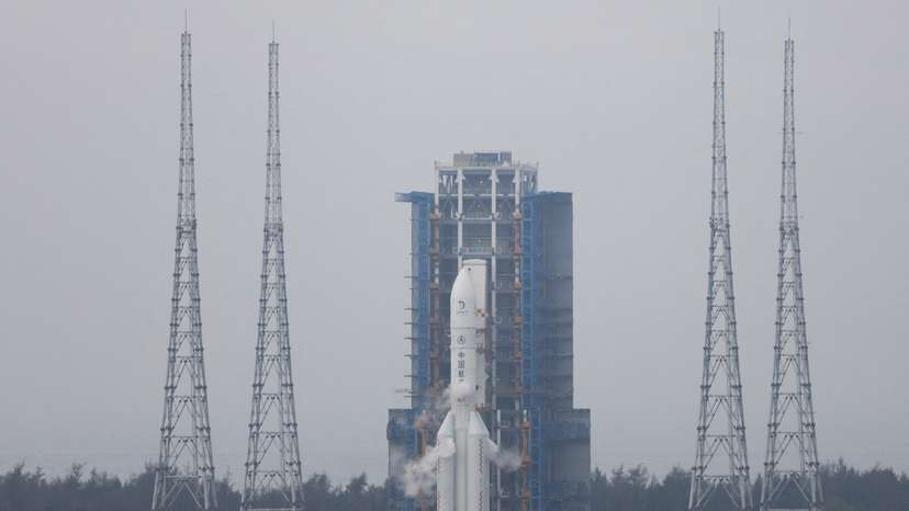 FILE PHOTO: The Chang'e 6 lunar probe and the Long March-5 Y8 carrier rocket combination sit atop the launch pad at the Wenchang Space Launch Site in Hainan province