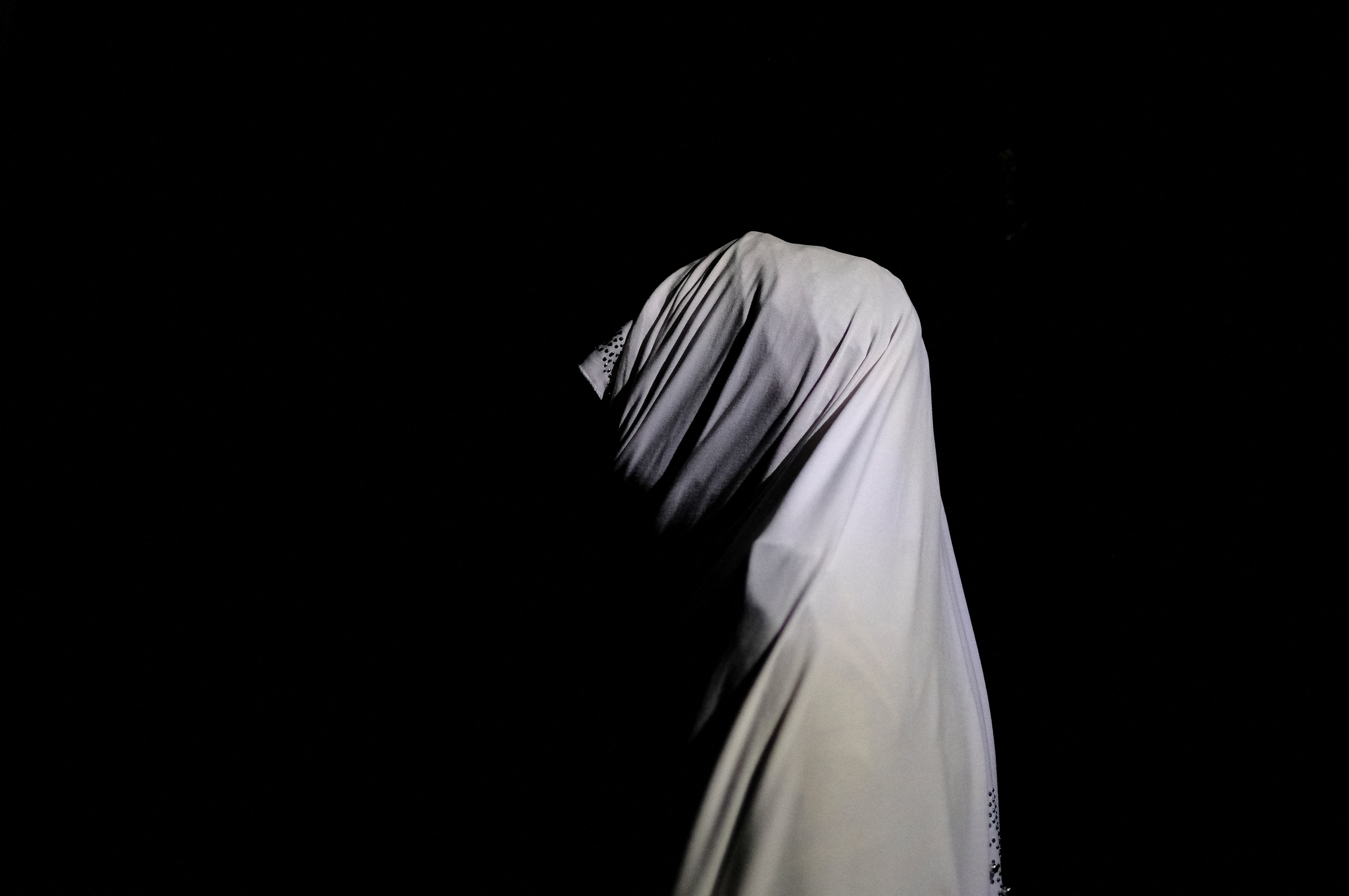 FILE PHOTO: A Nigerian woman who told Reuters she received an abortion under a secret program run by the Nigerian military, poses for a portrait in an undisclosed location in Nigeria