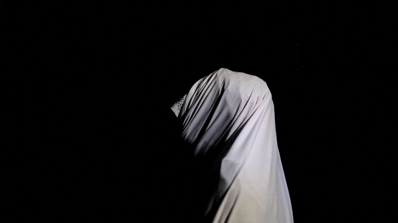 FILE PHOTO: A Nigerian woman who told Reuters she received an abortion under a secret program run by the Nigerian military, poses for a portrait in an undisclosed location in Nigeria