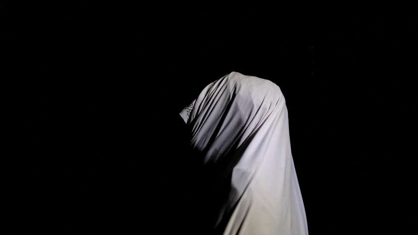 FILE PHOTO: A Nigerian woman who told Reuters she received an abortion under a secret program run by the Nigerian military, poses for a portrait in an undisclosed location in Nigeria