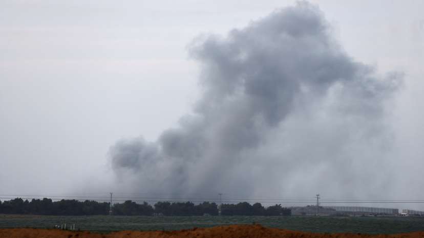Smoke rises above the Gaza Strip as seen from Israel's border with Gaza