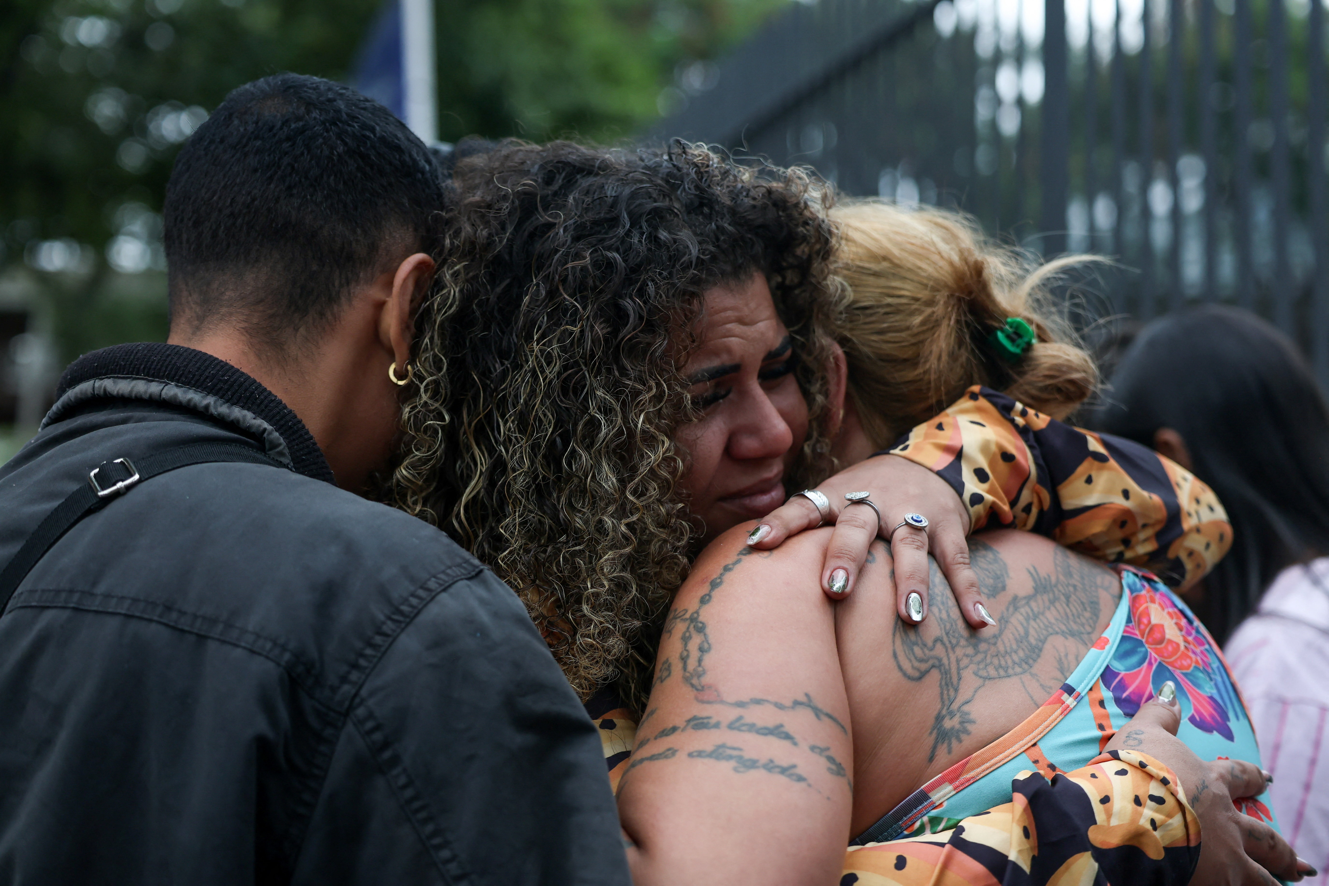 Relatives of deceased wait to identify bodies after deadly police operation in Rio de Janeiro