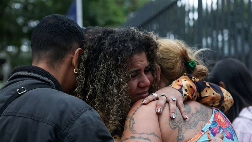 Relatives of deceased wait to identify bodies after deadly police operation in Rio de Janeiro