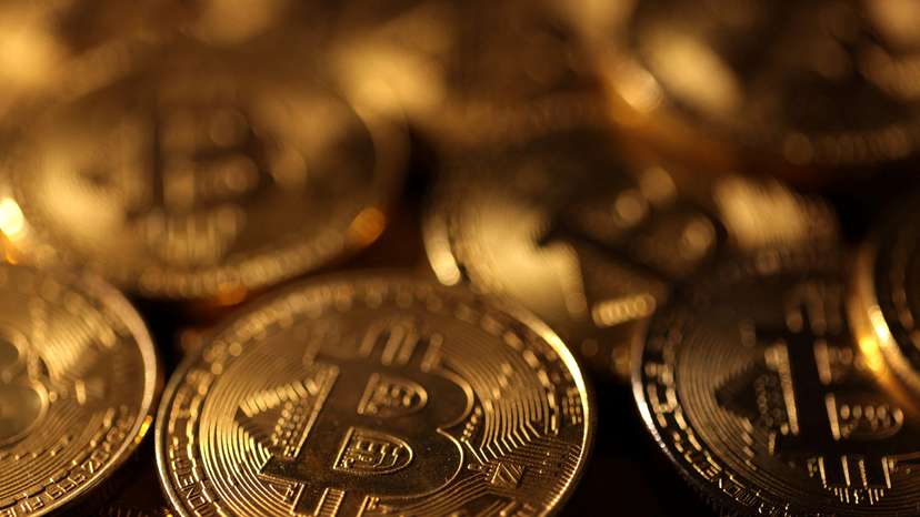 Illustration shows representations of cryptocurrency Bitcoin